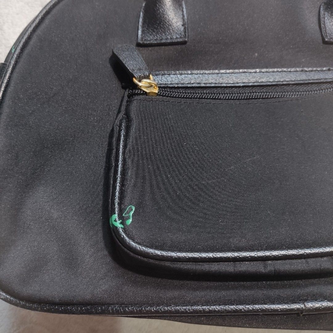 Black Plain Vintage Thick Canvas/Nylon Shoulder Bag (Category: Shoulder Bags) located in Bacoor. Submitted by kmrynl (Listing ID 1447380421, Image 2). Description: Rfs: decluttering - issue: small green paint (see photos) - thick material, spacious - see last photos for measurements (in) MOP: Gcash/BPI/Maribank only MOD: J&T/Lalamove.