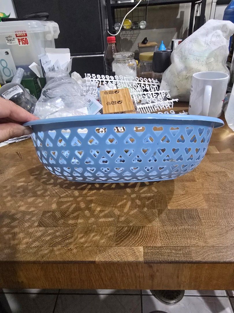 Blue Plastic Fruit/Vegetable Tray (Category: Storage Boxes & Baskets) located in Makati City. Submitted by shopaholicsgallery (Listing ID 1447395546, Image 2). Description: - Light blue plastic basket - Features a cool geometric pattern - Ideal for organizing small items - Versatile use: kitchen, bathroom, crafts - Easy to clean - Convenient size for various needs - RFS: decluttering.