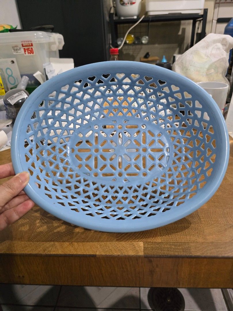 Blue Plastic Fruit/Vegetable Tray (Category: Storage Boxes & Baskets) located in Makati City. Submitted by shopaholicsgallery (Listing ID 1447395546, Image 3). Description: - Light blue plastic basket - Features a cool geometric pattern - Ideal for organizing small items - Versatile use: kitchen, bathroom, crafts - Easy to clean - Convenient size for various needs - RFS: decluttering.