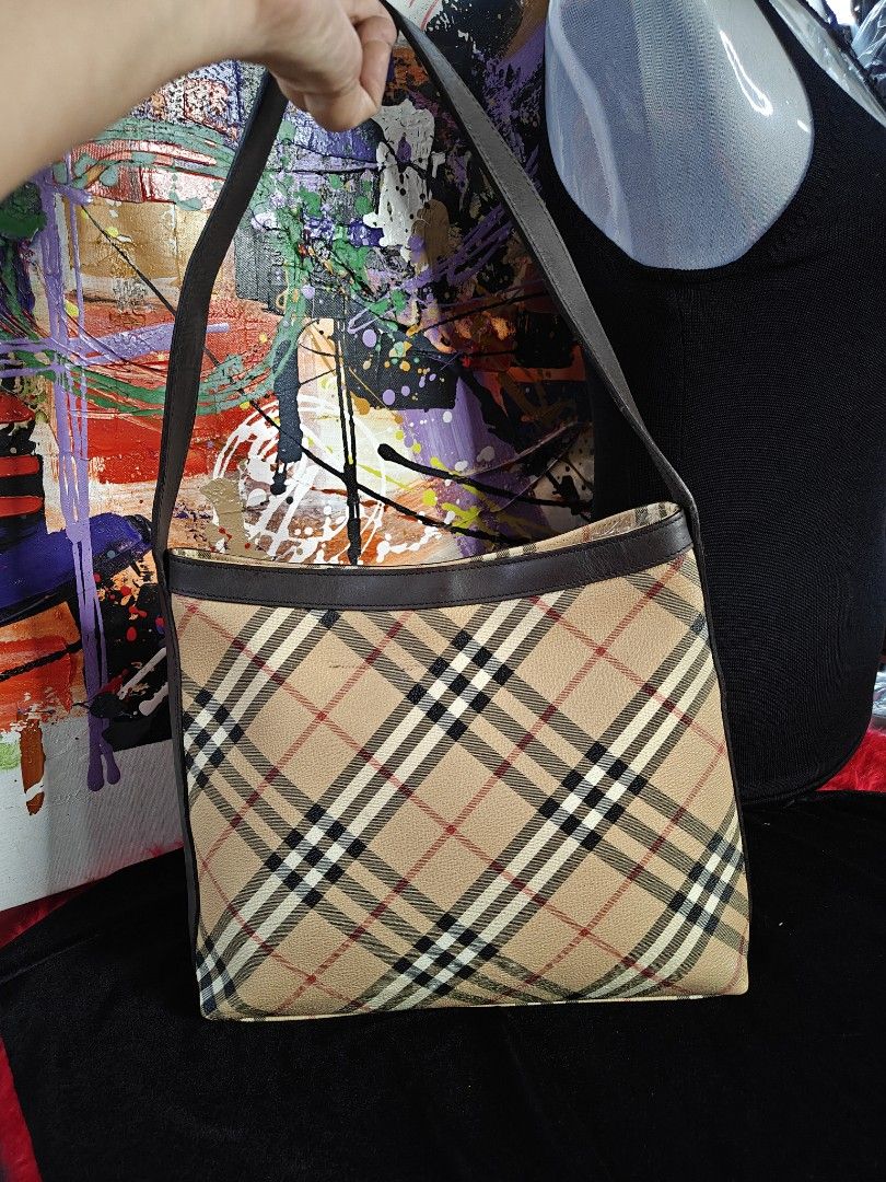 Burberry Haymarket Check Shoulder Bag (Category: Luxury Bags & Wallets) located in Las Pinas. Submitted by liezel49 (Listing ID 1447307464, Image 1). Description: Classic Burberry Haymarket check shoulder bag with leather trim. Perfect for daily use.no flaws .