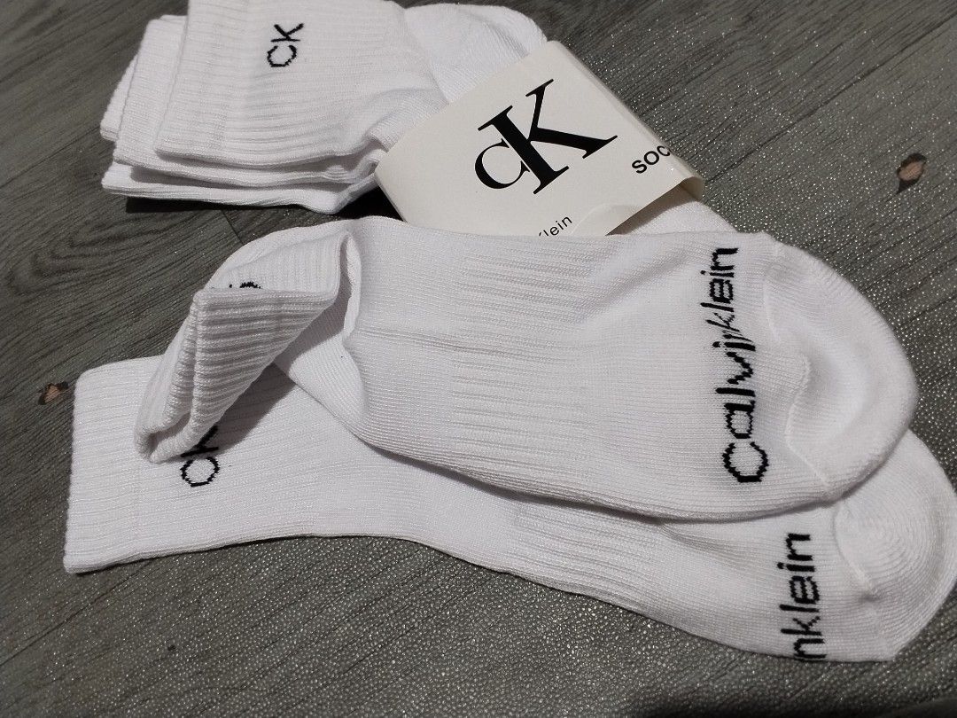 Calvin Klein White Socks (3 Pairs) (Category: Socks) located in Manila. Submitted by goldencat-d0c5 (Listing ID 1447410817, Image 2). Description: - Pack of 3 white Calvin Klein socks - Low cut style - Ribbed cuff for a snug fit - CK logo on cuff and Calvin Klein name on side - Ideal for everyday wear.