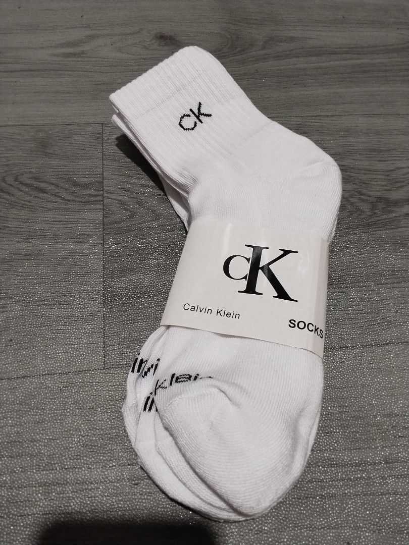 Calvin Klein White Socks (3 Pairs) (Category: Socks) located in Manila. Submitted by goldencat-d0c5 (Listing ID 1447410817, Image 1). Description: - Pack of 3 white Calvin Klein socks - Low cut style - Ribbed cuff for a snug fit - CK logo on cuff and Calvin Klein name on side - Ideal for everyday wear.