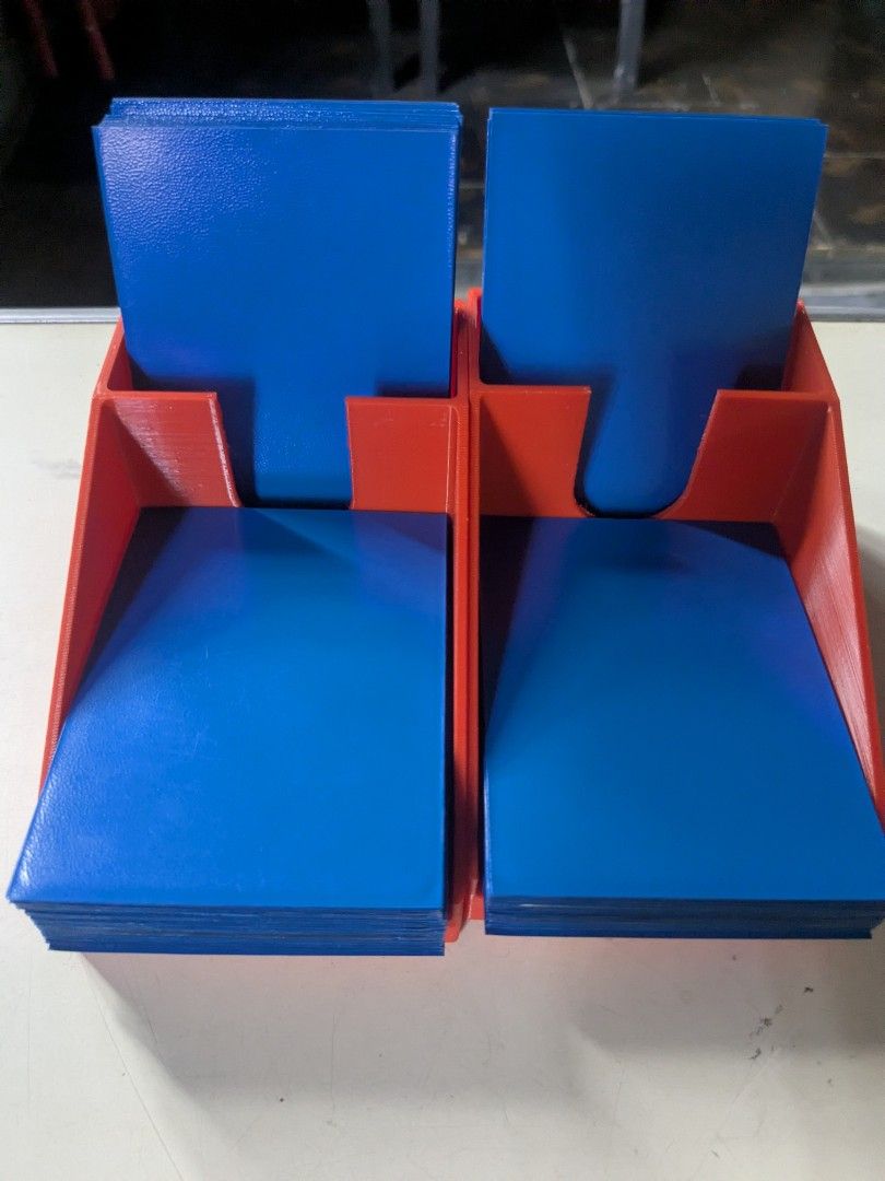 Card Game Holder / Standee (Category: Trading Cards Accessories) located in Quezon City. Submitted by lancelotchase023 (Listing ID 1447325658, Image 2). Description: 650 all - 3D printer red holder 100 all - 10pcs wooden card holder 600 take all Use for Card games like Marvel Champions or other Card/Board Games .