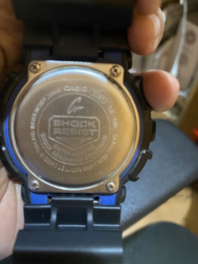 Casio G-Shock GA-100 Analog Digital Watch (Category: Men's Watches) located in Makati City. Submitted by jdeep9 (Listing ID 1447373027, Image 2). Description: - Black G-Shock watch with striking blue accents - Features both analog and digital displays - Built for durability: shock resistant and water resistant - Comfortable and tough resin band - Ideal for everyday wear and active lifestyles - Sold in its current condition (as is).