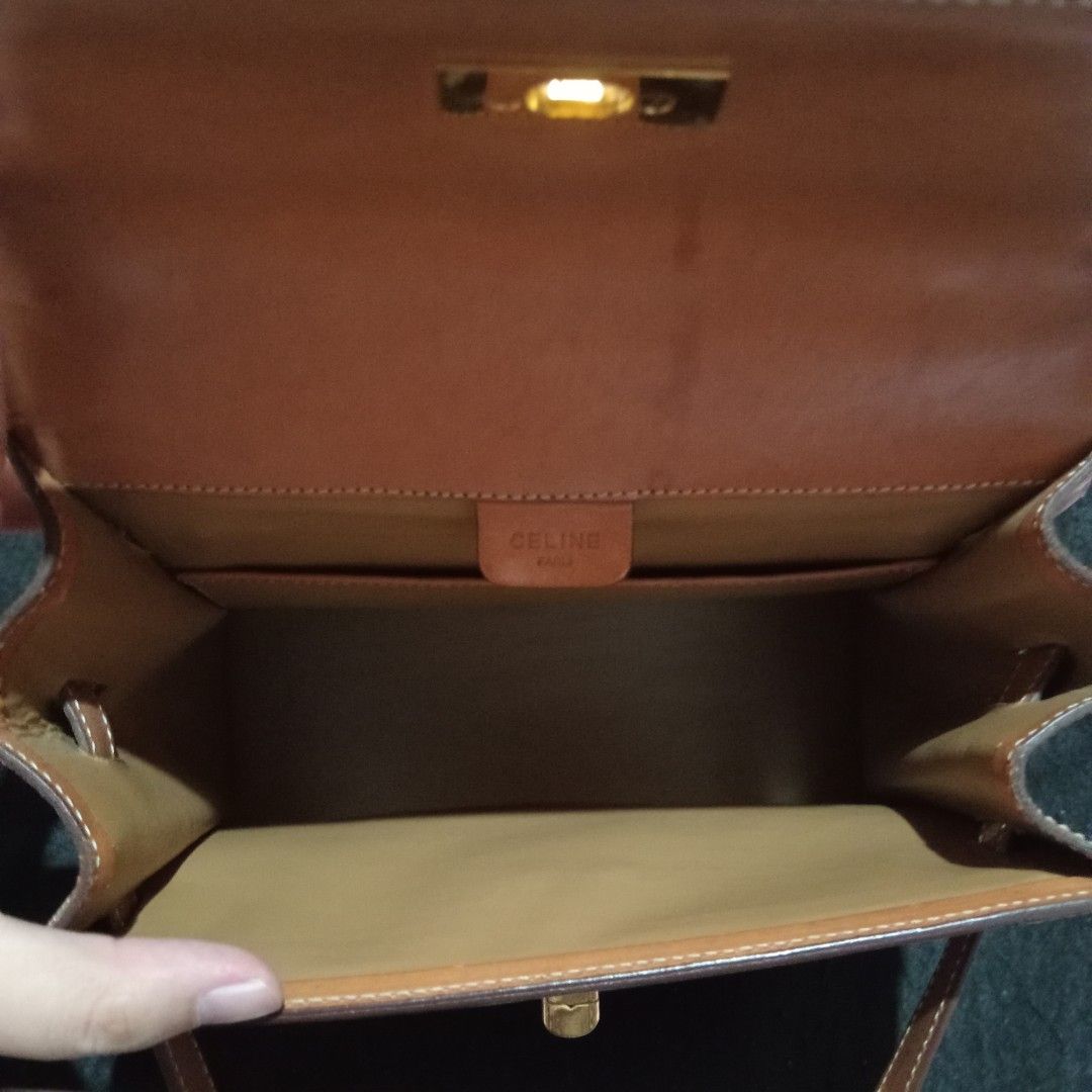 Celine Macadam Vintage Bag (Category: Luxury Bags & Wallets) located in Lipa City. Submitted by bookshaven (Listing ID 1447401054, Image 2). Description: Vintage Celine Macadam Turn Lock Kelly Style Shoulder Bag -authentic -not bnew, with sign of usage -interior: main compartment + small pocket -adjustable strap.