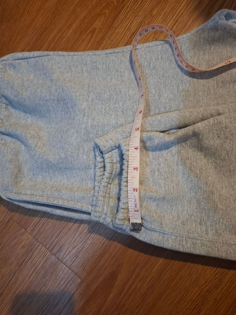 Champion Authentic Athletic Apparel Grey Sweatpants Jogging Pants (Category: Joggers) located in Bacolod City. Submitted by gluisa97 (Listing ID 1447361508, Image 2). Description: - Authentic Champion Grey Sweatpants - Comfortable elastic waistband and cuffs - Perfect for workouts or casual lounging - Approximate Measurements: - Waist (unstretched): 13 inches - Inseam: 30 inches - Outseam: 42 inches - Please check photos for detailed condition..