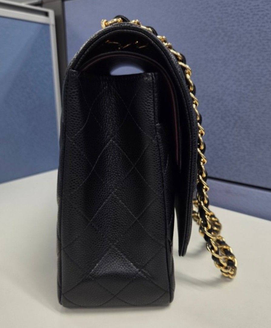 Chanel Maxi Double Flap (GHW) (Category: Luxury Bags & Wallets) located in Cainta. Submitted by heartstuffph (Listing ID 1447349131, Image 3). Description: Pls read carefully: - Super Premium Quality Maxi Chanel flap bag - Black quilted caviar leather - Gold hardware - Iconic CC turn-lock closure - Leather-woven chain strap - Timeless and great for any occasion -.