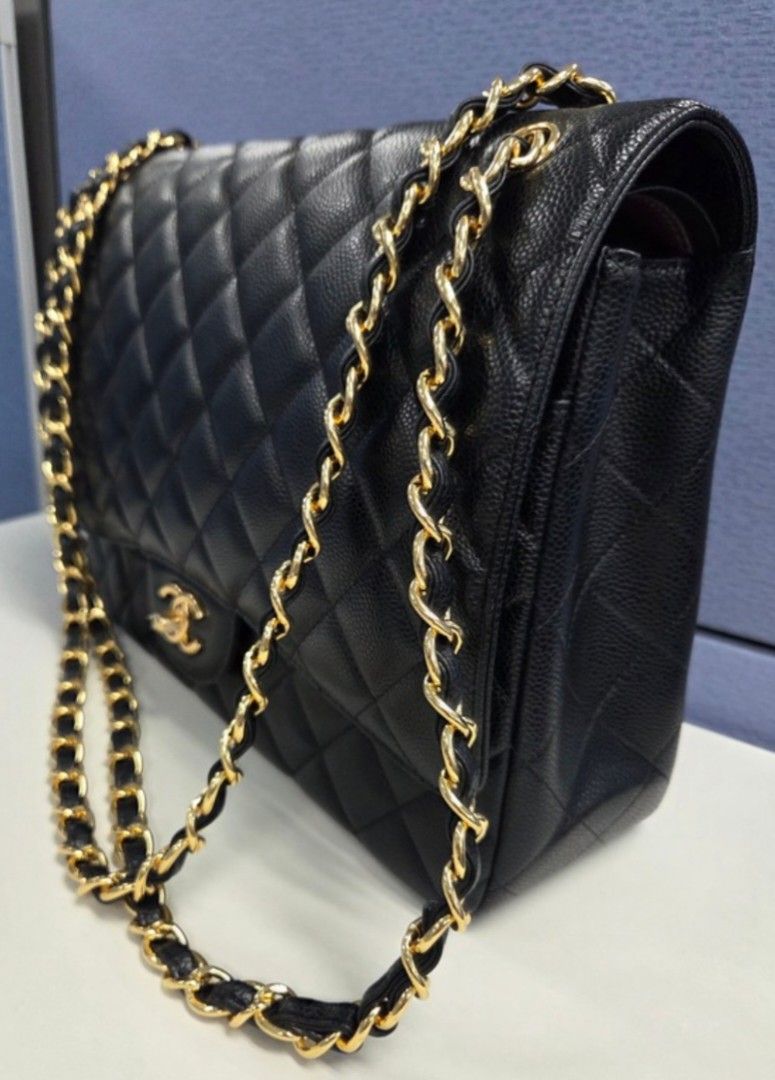 Chanel Maxi Double Flap (GHW) (Category: Luxury Bags & Wallets) located in Cainta. Submitted by heartstuffph (Listing ID 1447349131, Image 2). Description: Pls read carefully: - Super Premium Quality Maxi Chanel flap bag - Black quilted caviar leather - Gold hardware - Iconic CC turn-lock closure - Leather-woven chain strap - Timeless and great for any occasion -.