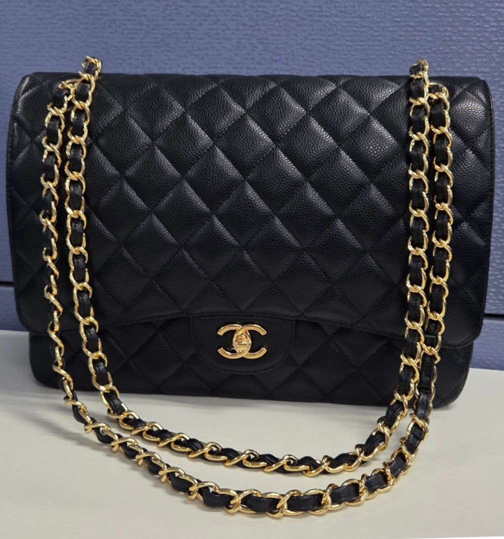 Chanel Maxi Double Flap (GHW) (Category: Luxury Bags & Wallets) located in Cainta. Submitted by heartstuffph (Listing ID 1447349131, Image 1). Description: Pls read carefully: - Super Premium Quality Maxi Chanel flap bag - Black quilted caviar leather - Gold hardware - Iconic CC turn-lock closure - Leather-woven chain strap - Timeless and great for any occasion -.