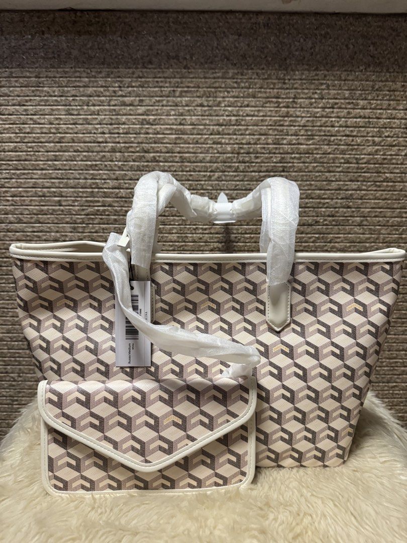 Christy Ng Medium Tote Bag with Pouch White (Category: Luxury Bags & Wallets) located in San Pablo. Submitted by simplicitybeaute (Listing ID 1447429021, Image 1). Description: .