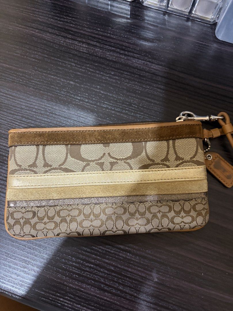 Coach Patchwork wristlet (Category: Luxury Bags & Wallets) located in Manila. Submitted by annescrap (Listing ID 1447424585, Image 1). Description: Coach patchwork wristlet (issue is posted) - minimal issue - dm for more pics - can communicate thru fb and ig mop: gcash/gotyme mod: j&t/lalamove .