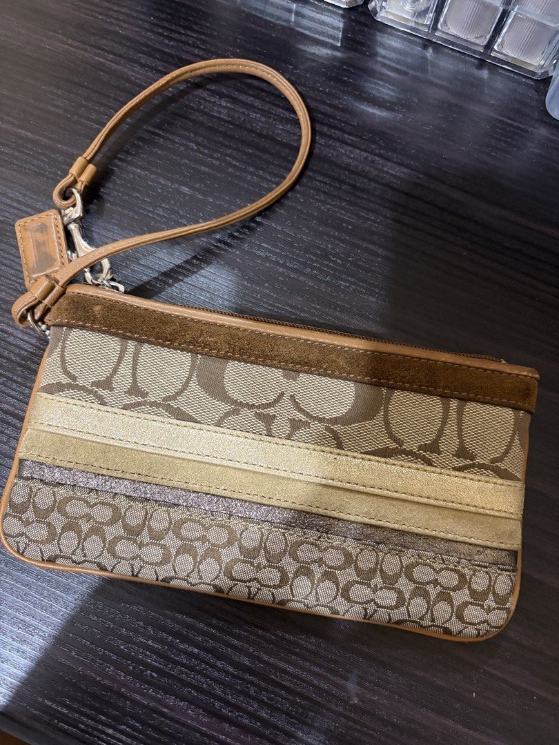 Coach Patchwork wristlet (Category: Luxury Bags & Wallets) located in Manila. Submitted by annescrap (Listing ID 1447424585, Image 3). Description: Coach patchwork wristlet (issue is posted) - minimal issue - dm for more pics - can communicate thru fb and ig mop: gcash/gotyme mod: j&t/lalamove .