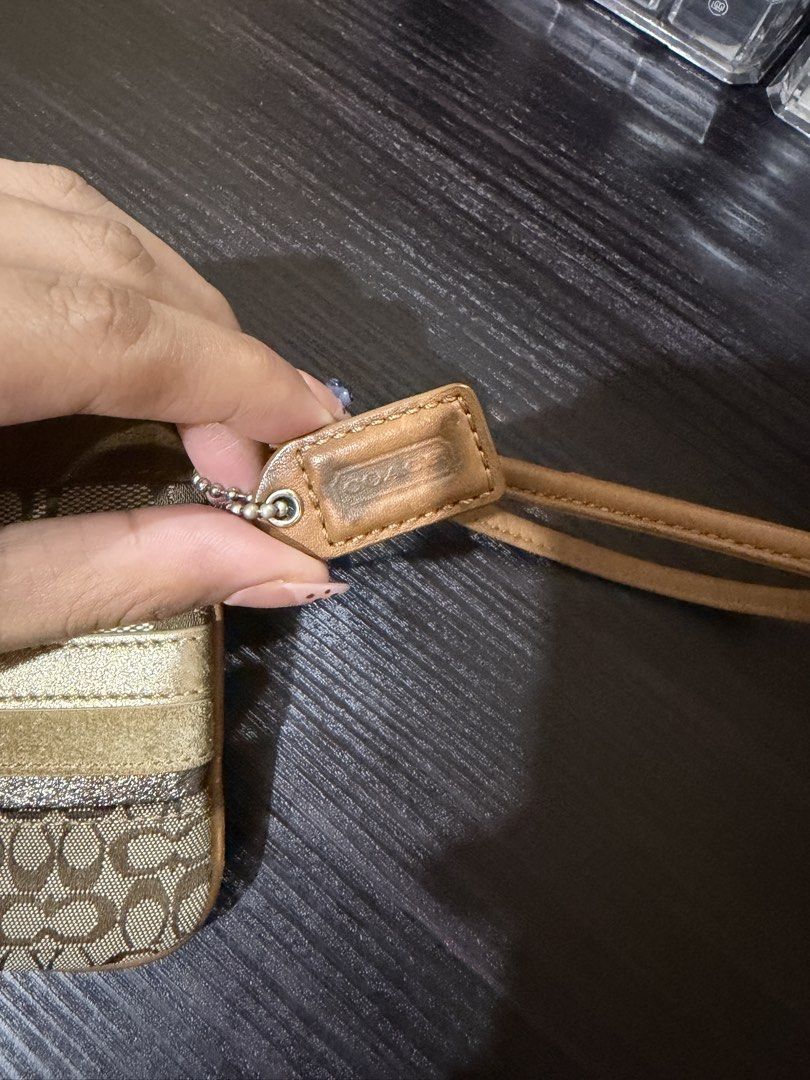 Coach Patchwork wristlet (Category: Luxury Bags & Wallets) located in Manila. Submitted by annescrap (Listing ID 1447424585, Image 2). Description: Coach patchwork wristlet (issue is posted) - minimal issue - dm for more pics - can communicate thru fb and ig mop: gcash/gotyme mod: j&t/lalamove .