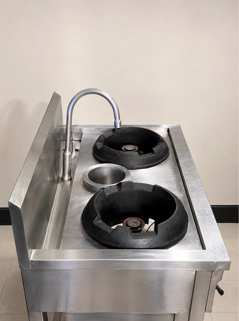 Commercial Double Wok Burner with Sink (Category: Cookware & Accessories) located in Quezon City. Submitted by mybee (Listing ID 1427310952, Image 2). Description: FOR SALE: Commercial Double Wok Burner with Sink 🔥 ✔ Stainless steel body ✔ 2 heavy-duty wok burners ✔ Built-in sink with faucet ✔ With gas hose and controls ✔ Ideal for food business / carinderia / commissary ✔ RFS: No longer using it ✔ Condition: Pre-owned. Not tested recently, sell