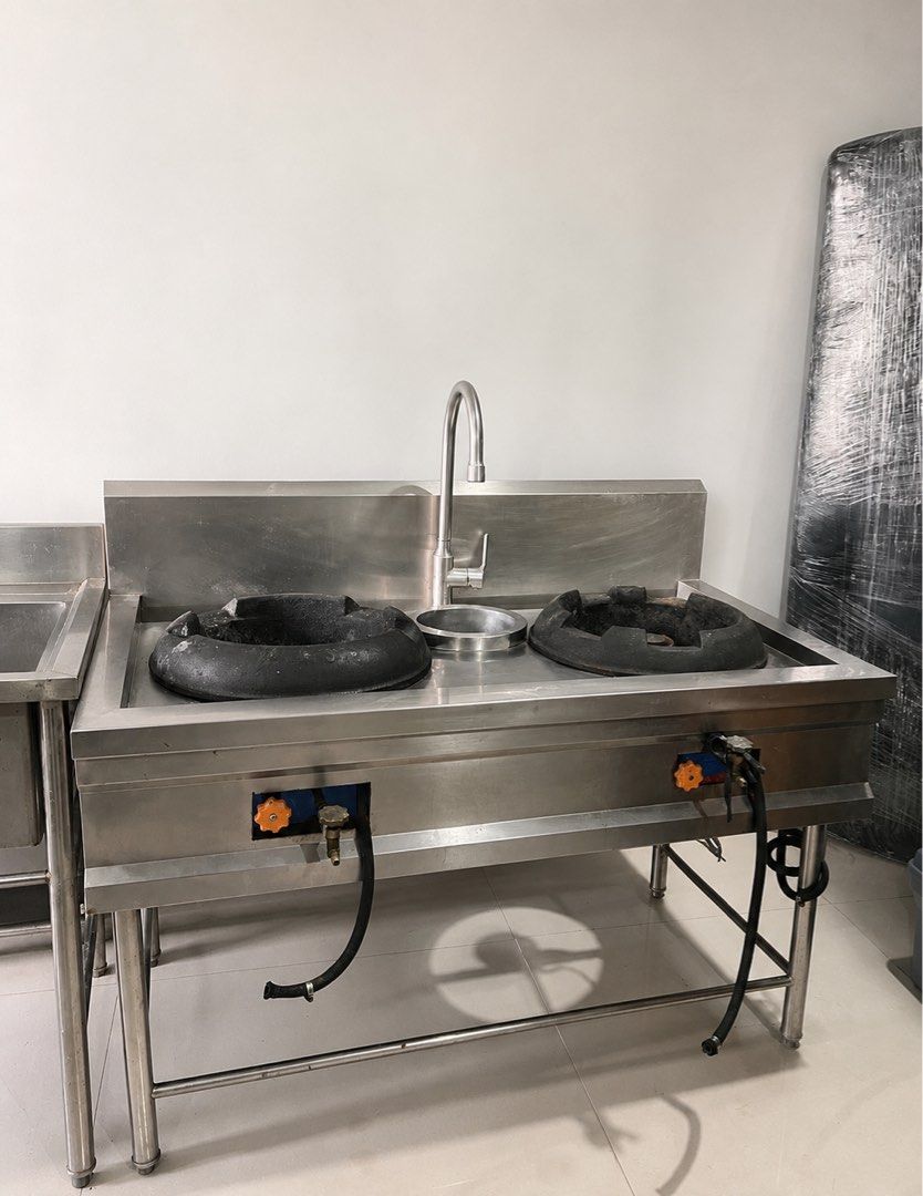 Commercial Double Wok Burner with Sink (Category: Cookware & Accessories) located in Quezon City. Submitted by mybee (Listing ID 1427310952, Image 1). Description: FOR SALE: Commercial Double Wok Burner with Sink 🔥 ✔ Stainless steel body ✔ 2 heavy-duty wok burners ✔ Built-in sink with faucet ✔ With gas hose and controls ✔ Ideal for food business / carinderia / commissary ✔ RFS: No longer using it ✔ Condition: Pre-owned. Not tested recently, sell