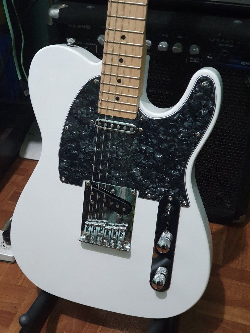 Custom Telecaster (Category: Musical Instruments) located in Quezon City. Submitted by drtone (Listing ID 1447339207, Image 2). Description: JCraft Tele Classic Polar white S/S D neck Customized bnew Pearl pickguard New tele open neck p-up 4way switch 50's wiring Shielded Setup for lowest action Intonated New daddario exl120 Gig ready Comes with unused bag and strap. Tandang sora qc Open for trades Last price posted No reply means not interested.
