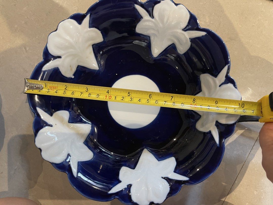 Dark Blue Floral Ceramic Bowls (Category: Dinnerware & Cutlery) located in Cebu City. Submitted by girlalou (Listing ID 1447304302, Image 2). Description: -beautiful ceramic bowls - Deep blue color with delicate white floral accents - Elegant scalloped edges for a lovely shape - Features a charming white circle detail in the center - Ideal for serving snacks or as decorative pieces - Diameter: Approximately 8 inches -200 each.