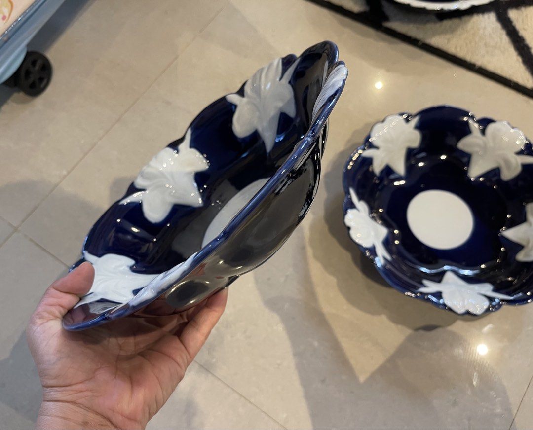 Dark Blue Floral Ceramic Bowls (Category: Dinnerware & Cutlery) located in Cebu City. Submitted by girlalou (Listing ID 1447304302, Image 3). Description: -beautiful ceramic bowls - Deep blue color with delicate white floral accents - Elegant scalloped edges for a lovely shape - Features a charming white circle detail in the center - Ideal for serving snacks or as decorative pieces - Diameter: Approximately 8 inches -200 each.