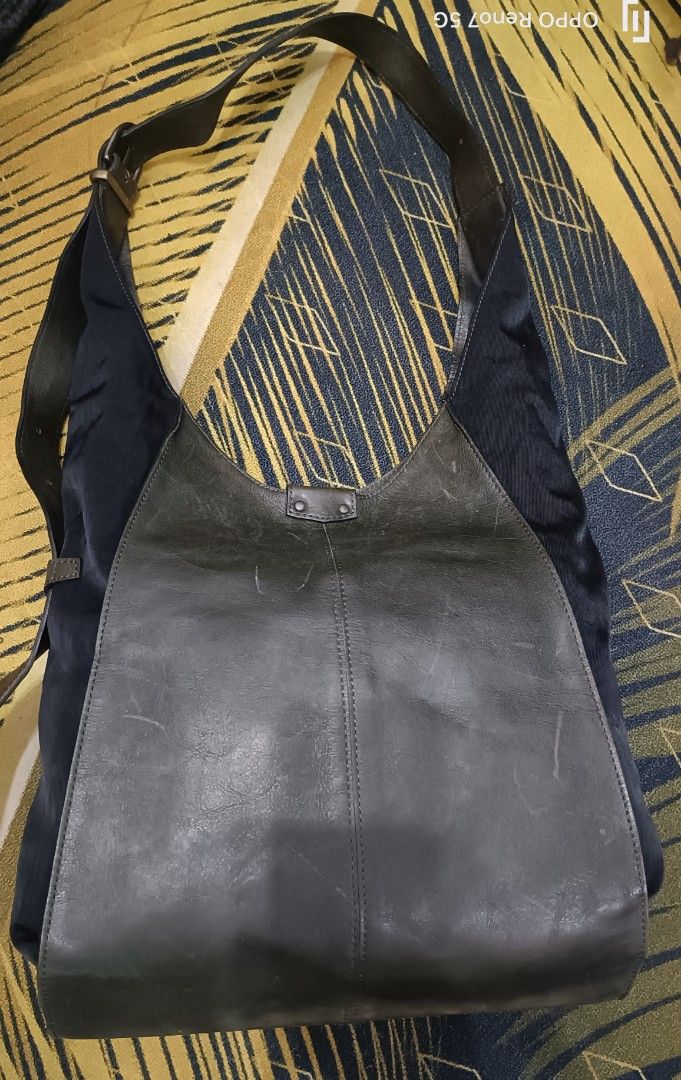 Dark Grey Leather and Navy Fabric 9Shoulder Bag (Category: Shoulder Bags) located in Skudai. Submitted by tripleajay (Listing ID 1447405587, Image 1). Description: - Stylish cool shoulder bag - Unique mix of worn-in leather front and spacious navy fabric body - Comfortable adjustable strap - Ideal for everyday carry.