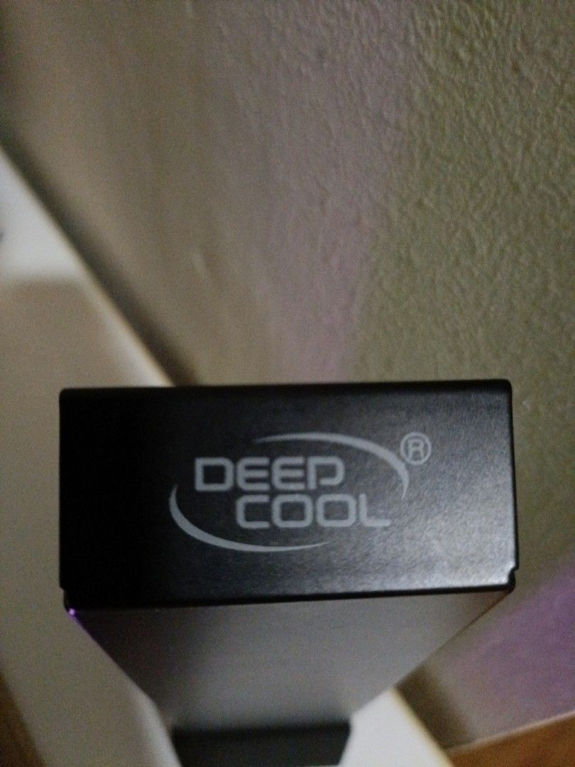 DEEPCOOL Adjustable gpu support bracket (Category: Desktops) located in Singapore. Submitted by johntan420 (Listing ID 1447456342, Image 3). Description: - Color: Black - Features a mountable base with double-sided tape - Height adjustable via notched track.