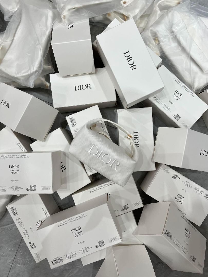 DIOR WHITE TROUSSE COSMETIC POUCH (Category: Makeup) located in Muntinlupa City. Submitted by chevyxcs (Listing ID 1447430036, Image 1). Description: DIOR WHITE TROUSSE COSMETIC POUCH 10pcs left.