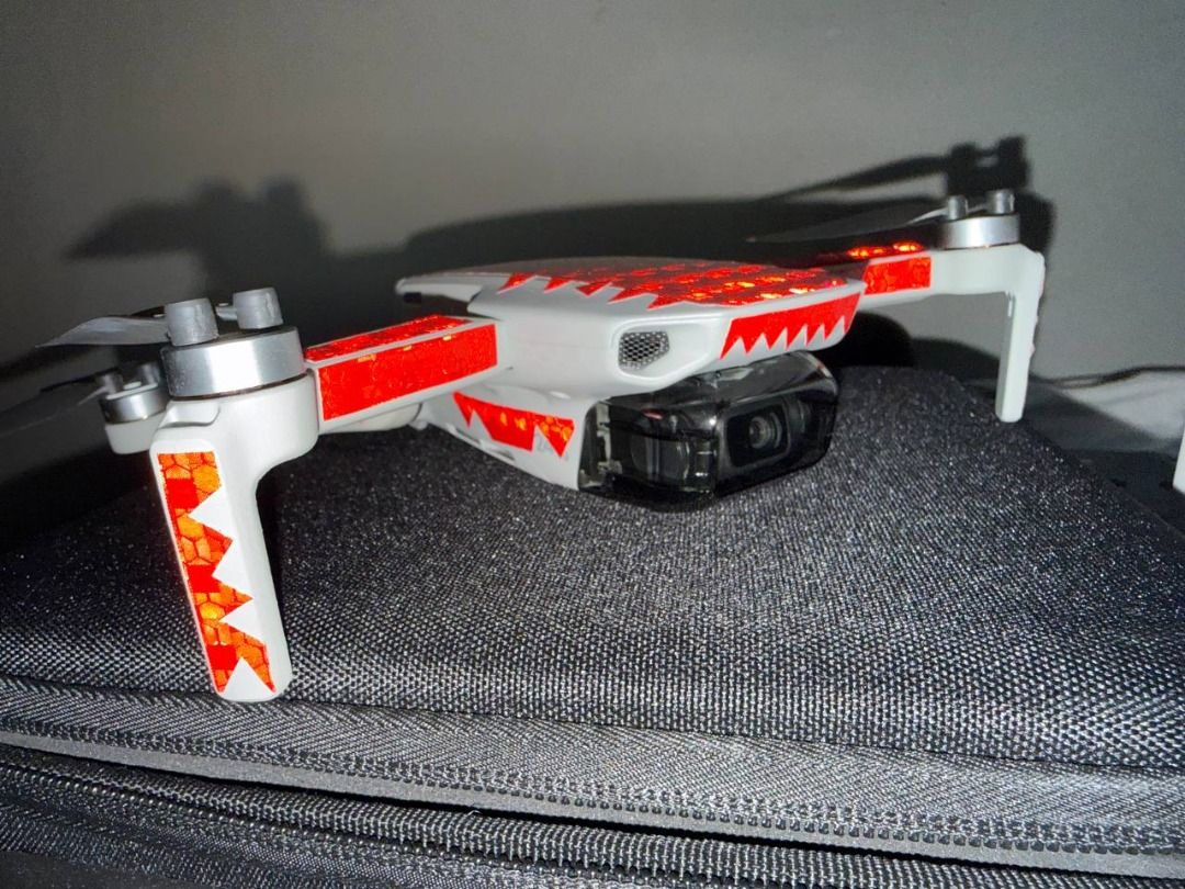 DJI Mini 4k Fly More Combo (Category: Drones) located in Binan City. Submitted by calvin654132317 (Listing ID 1447410358, Image 2). Description: - DJI Mini 4K Fly More Combo - Php 13000 Only! Used 3 Times - Ultra-lightweight drone (under 249g) - Includes drone, remote controller, and carrying case - Comes with 3 intelligent flight batteries and a multi-battery charging hub - Features eye-catching red reflective stickers for enhanced visibility - 