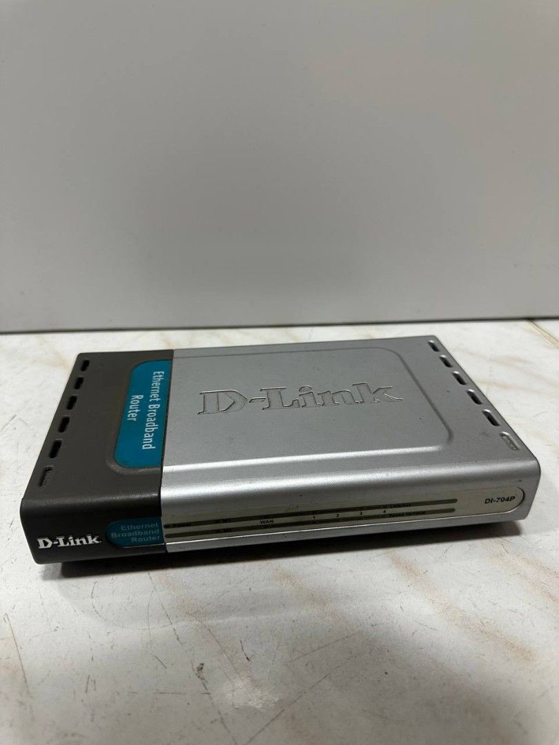 D-Link DI-704P Ethernet Broadband Router (Category: Networking) located in Valenzuela. Submitted by jochaaa011 (Listing ID 1447301462, Image 1). Description: - D-Link DI-704P Ethernet Broadband Router - NO ADAPTORS INCLUDED - Features 4 LAN ports for connecting multiple devices - Includes 1 WAN port for internet connection - Also has a parallel port - Tested and confirmed working - Ideal for setting up a reliable home network.