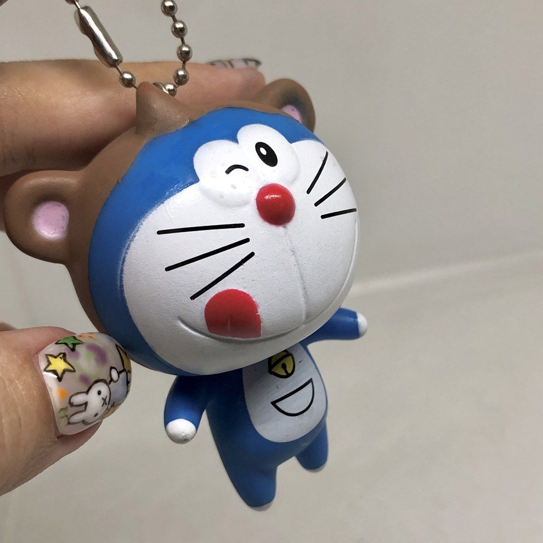 DORAEMON KEYCHAIN (Category: Character Goods) located in Quezon City. Submitted by kitsune.treasures (Listing ID 1447395717, Image 2). Description: *First to pay policy! *1 day reservation only. Failure to pay on time, auto cancel. 📍Quezon City * MOD: J&T | Lalamove * MOP: GCASH | BPI 📦ON HAND AND READY TO SHIP CONDITION: WHAT YOU SEE IS WHAT YOU GET. Dimensions: Kindly check the photos for the actual measurements. Please check all the photos f