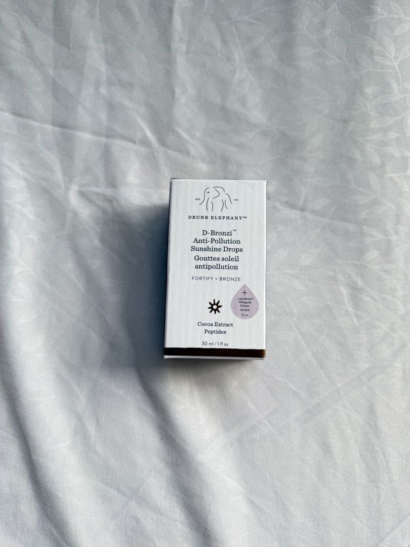 Drunk Elephant Bronzing Anti-Pollution Drops (Category: Makeup) located in Manila. Submitted by boxesbybelle (Listing ID 1447428669, Image 1). Description: Drunk Elephant Bronzing Drops (30ml) — BNEW + comes with free lala whipped cream sample, retails for $39 / ₱2,400.