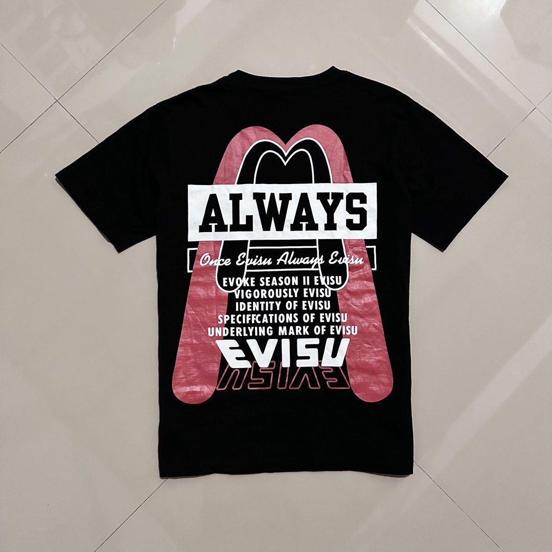 Evisu x Champion Shirt (Category: Tshirts & Polo Shirts ) located in Irosin. Submitted by kylebri (Listing ID 1447405183, Image 1). Description: Champion X Evisu Shirt good as new condition no issue medium - large best fit 20.5W x 27L direct message me ! 📥.
