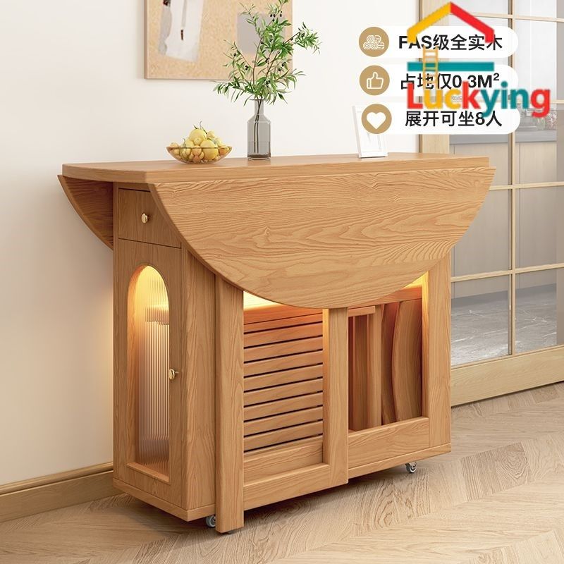 Foldable Extendable Solid Wood Round Dining Table Set (Category: Tables & Sets) located in Singapore. Submitted by franchesca24190 (Listing ID 1447419367, Image 3). Description: # Foldable Extendable Solid Wood Round Dining Table Set Wood folding chairs & leather folding chairs share the same price for same quantity ## 1. Full Solid Wood 120cm - Table only：548 - Table + 2 chairs：640 - Table + 4 chairs：732 ## 2. Full Solid Wood 100cm - Table only：