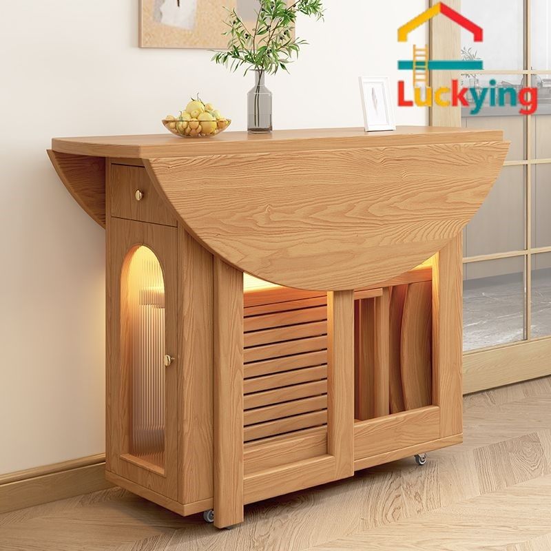 Foldable Extendable Solid Wood Round Dining Table Set (Category: Tables & Sets) located in Singapore. Submitted by franchesca24190 (Listing ID 1447419367, Image 2). Description: # Foldable Extendable Solid Wood Round Dining Table Set Wood folding chairs & leather folding chairs share the same price for same quantity ## 1. Full Solid Wood 120cm - Table only：548 - Table + 2 chairs：640 - Table + 4 chairs：732 ## 2. Full Solid Wood 100cm - Table only：