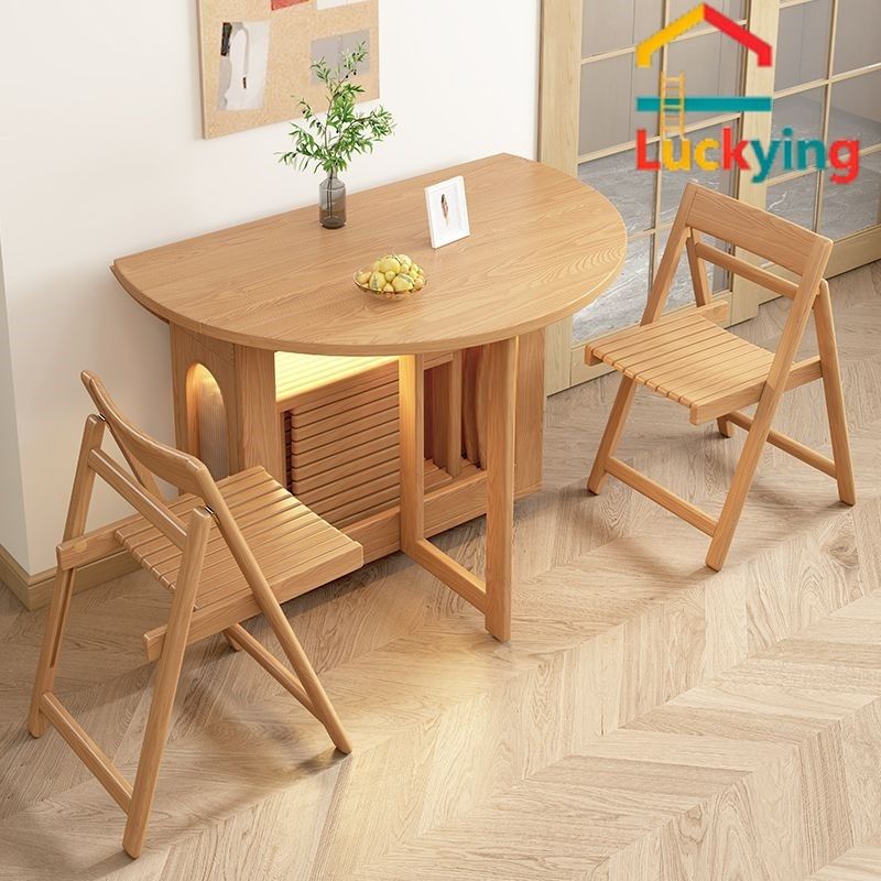 Foldable Extendable Solid Wood Round Dining Table Set (Category: Tables & Sets) located in Singapore. Submitted by franchesca24190 (Listing ID 1447419367, Image 1). Description: # Foldable Extendable Solid Wood Round Dining Table Set Wood folding chairs & leather folding chairs share the same price for same quantity ## 1. Full Solid Wood 120cm - Table only：548 - Table + 2 chairs：640 - Table + 4 chairs：732 ## 2. Full Solid Wood 100cm - Table only：