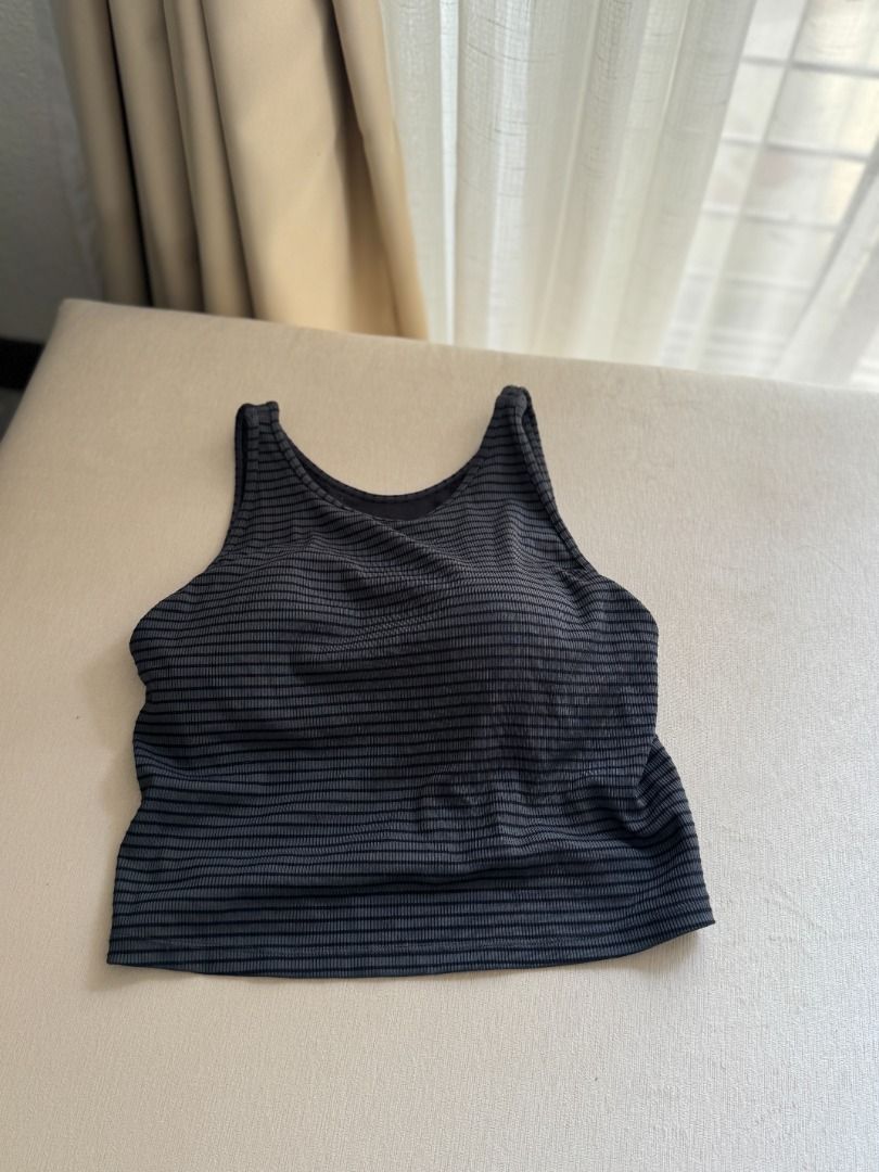 GU built in bra sleeveless grey top (Category: Sleeveless) located in Quezon City. Submitted by gogo.sparkle (Listing ID 1447326656, Image 2). Description: never worn pasalubong taiwan.