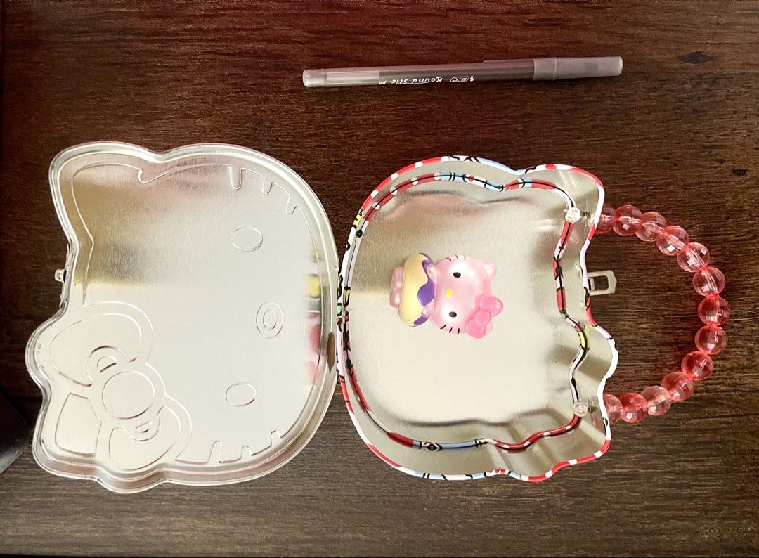Hello Kitty Tin Box with Handle and Mini Figure (Category: Vintage Collectibles) located in Las Pinas. Submitted by kayebee17 (Listing ID 1447322865, Image 3). Description: Pen for size reference .