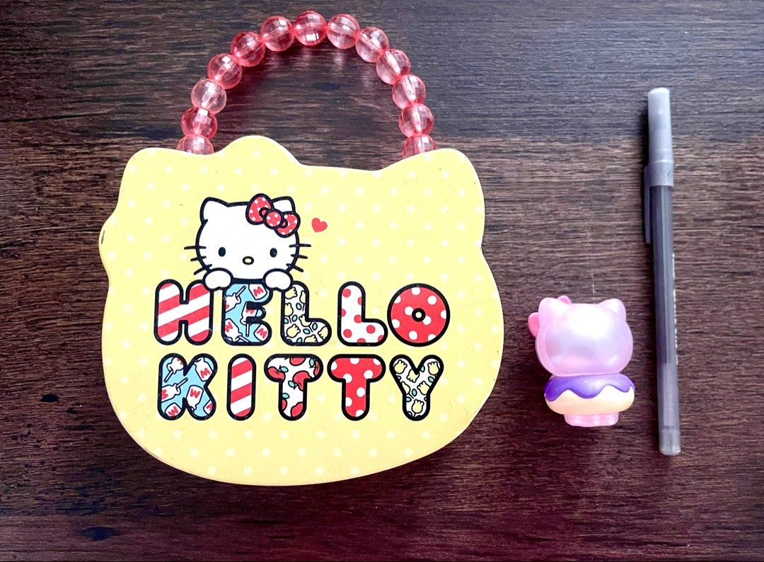 Hello Kitty Tin Box with Handle and Mini Figure (Category: Vintage Collectibles) located in Las Pinas. Submitted by kayebee17 (Listing ID 1447322865, Image 2). Description: Pen for size reference .
