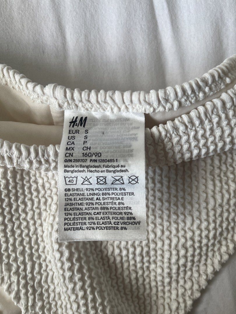 H&M Textured Bikini Set Cream Size S (Category: Bikinis & Swimsuits) located in Manila. Submitted by __ipppip (Listing ID 1447381666, Image 2). Description: - H&M cream textured bikini set - Square neck top - High-waisted bottoms - Comfortable ribbed fabric - Perfect for beach or pool - Size S.