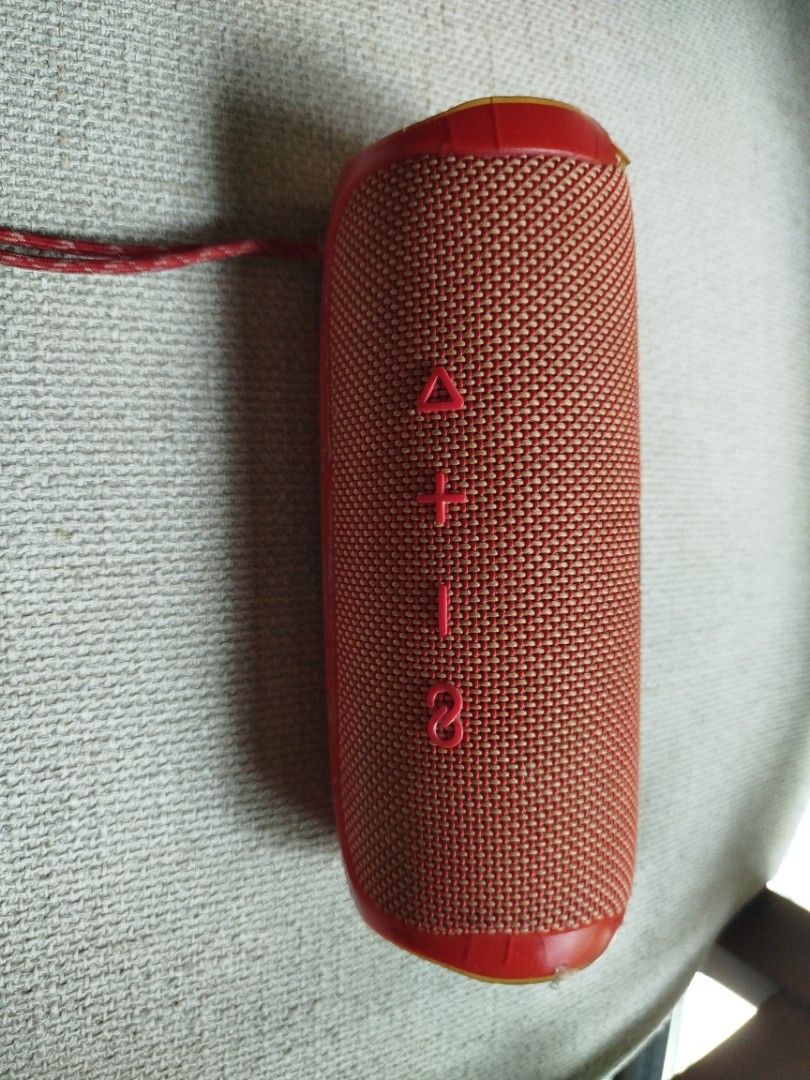 JBL Flip 5 Red Portable Bluetooth Speaker (Category: Soundbars, Speakers & Amplifiers) located in Paranaque City. Submitted by kaceys_closet (Listing ID 1447336911, Image 2). Description: - Red JBL Flip 5 speaker - Connects via Bluetooth - Side controls: volume and power - Built-in loop for easy carrying - Excellent sound quality for its compact size - Tested and confirmed working.