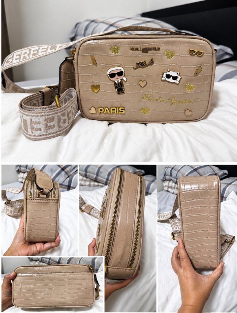 Karl Lagerfeld Crossbody Bag (Category: Cross-body Bags) located in Guagua. Submitted by dixie_1028 (Listing ID 1433242180, Image 1). Description: - Karl Lagerfeld crossbody bag - Textured exterior - Gold-tone hardware - Detachable strap with brand name - Adorned with decorative pins - Zipper closure.