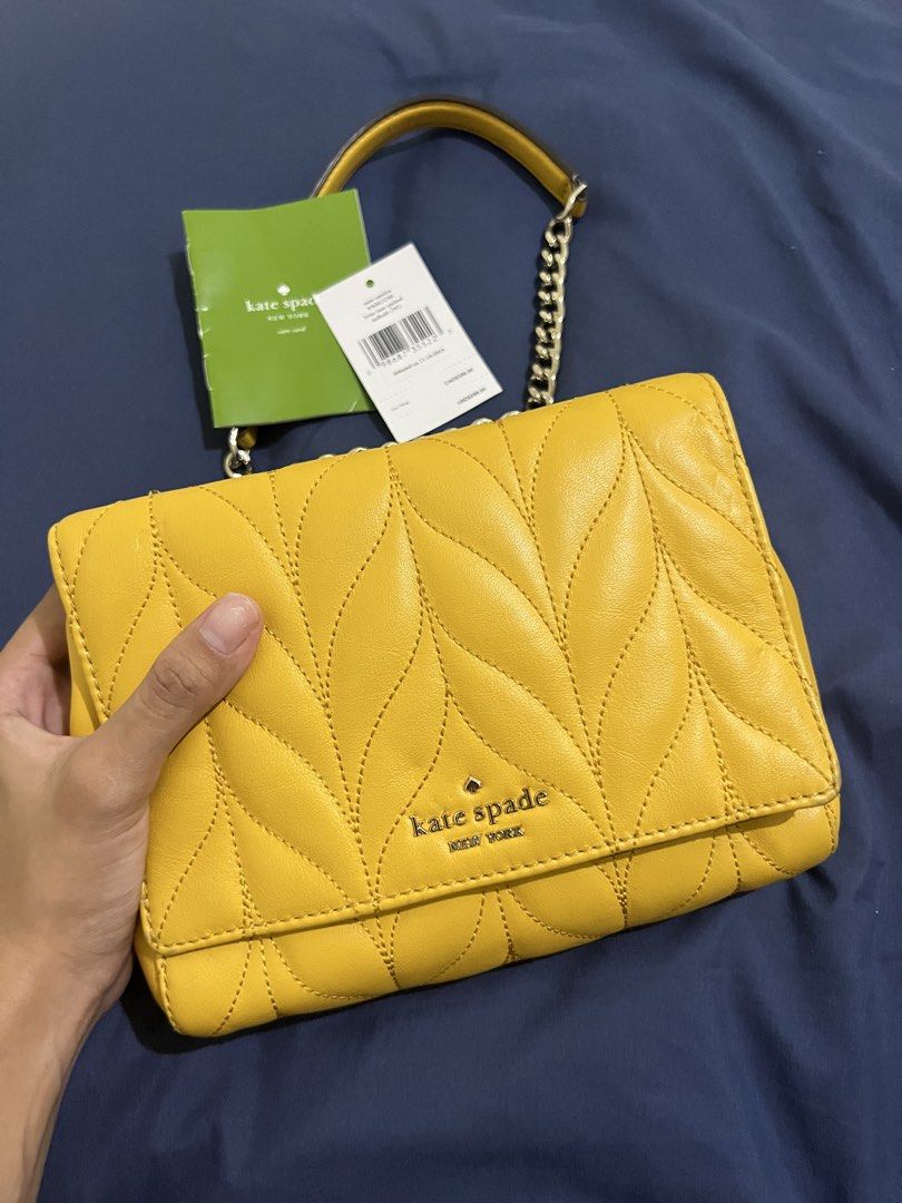Kate Spade Briar Lane Quilted Mini Emelyn (Category: Shoulder Bags) located in Manolo Fortich. Submitted by mfthrifts_ (Listing ID 1447398080, Image 3). Description: 💛This bag is not ukay-sourced. It is guaranteed authentic, bought directly in the USA💛 - Lightly used - Color: Mustard Yellow - Cow Leather - Gold chain strap (two way to wear; crossbody and shoulder) - Comes with original tags - Interior pocket - Adds a vibrant pop of color to you