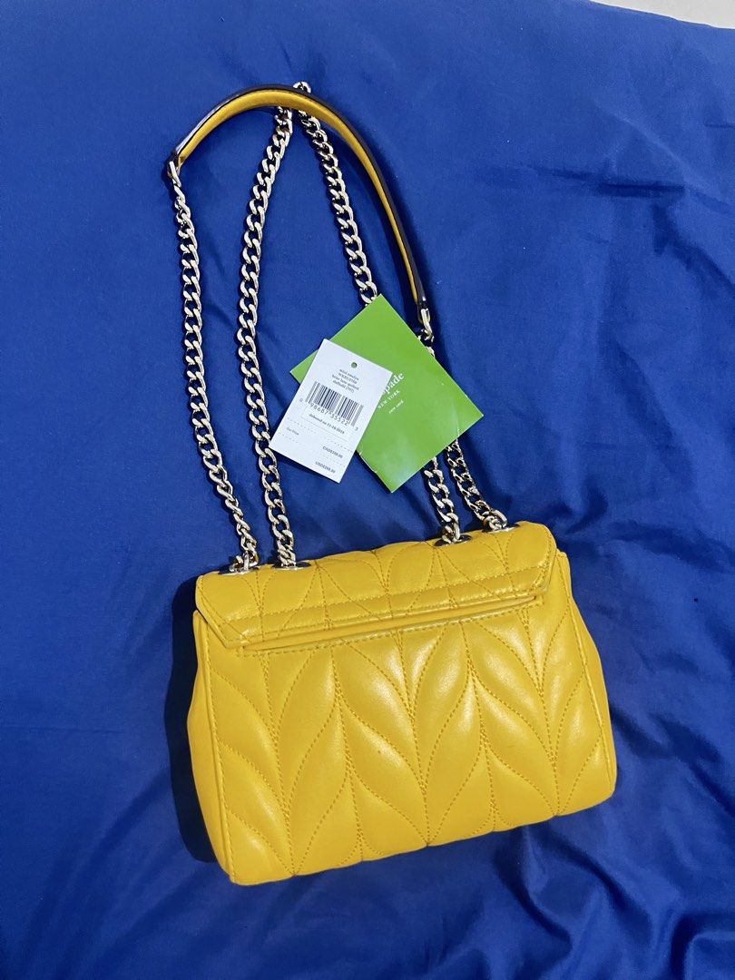 Kate Spade Briar Lane Quilted Mini Emelyn (Category: Shoulder Bags) located in Manolo Fortich. Submitted by mfthrifts_ (Listing ID 1447398080, Image 2). Description: 💛This bag is not ukay-sourced. It is guaranteed authentic, bought directly in the USA💛 - Lightly used - Color: Mustard Yellow - Cow Leather - Gold chain strap (two way to wear; crossbody and shoulder) - Comes with original tags - Interior pocket - Adds a vibrant pop of color to you