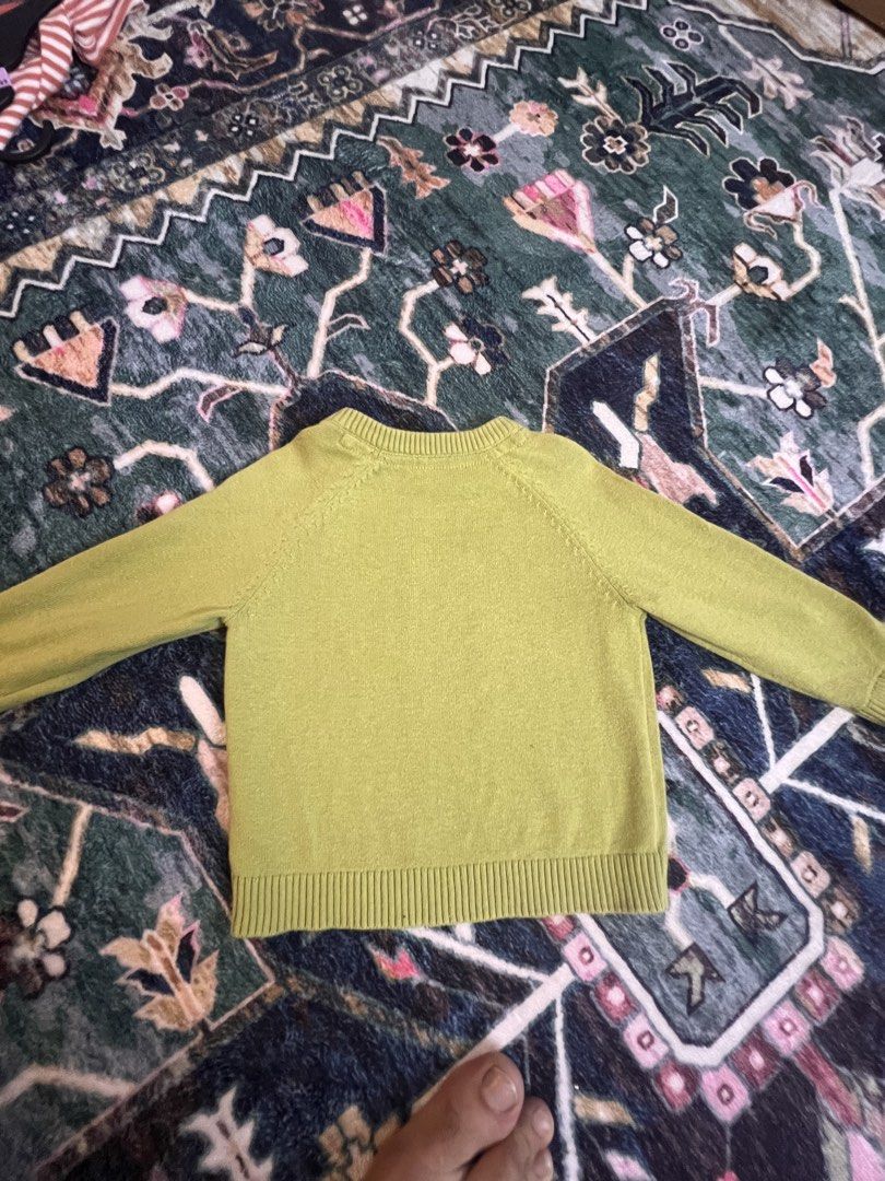 Kids Dinosaur Knit Sweater - Green (Category: Babies & Kids Fashion) located in Kuala Lumpur. Submitted by prelovedbyhisyam (Listing ID 1447429823, Image 3). Description: Negotiable - Cute green knit sweater for kids - Features a knitted dinosaur design on the front - Two wooden buttons at the shoulder for easy dressing - Ribbed cuffs and hem for a snug fit - Ideal for everyday wear and playtime.