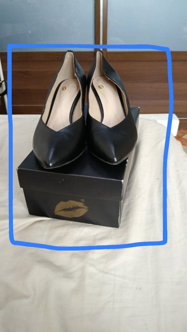 Kiss & Tell Black Pointed Toe Heels Size 42 (Category: Heels) located in Kuala Lumpur. Submitted by mb51000 (Listing ID 1447335198, Image 1). Description: - Brand: Kiss & Tell - Color: Black - Style: Pointed Toe Heels - Size: 42 - Features: Classic design, easy to pair with any outfit - Condition: Good, comes with original box - Occasion: Suitable for work or casual wear.