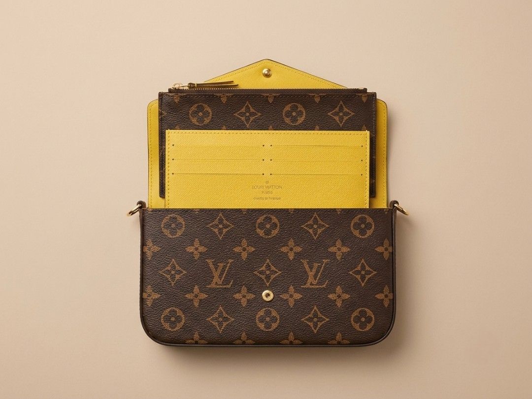 Louis Vuitton Monogram Wallet with Chain and Pouch (Category: Luxury Bags & Wallets) located in Caloocan City. Submitted by seishiyakinoku (Listing ID 1447355571, Image 2). Description: - Authentic Louis Vuitton Monogram Wallet - Includes removable yellow pouch - Comes with a gold chain strap - Features a card holder insert - Original box and dust bag included - Perfect for day or night use ​Description: ​Design: Inspired by the classic LV multi-