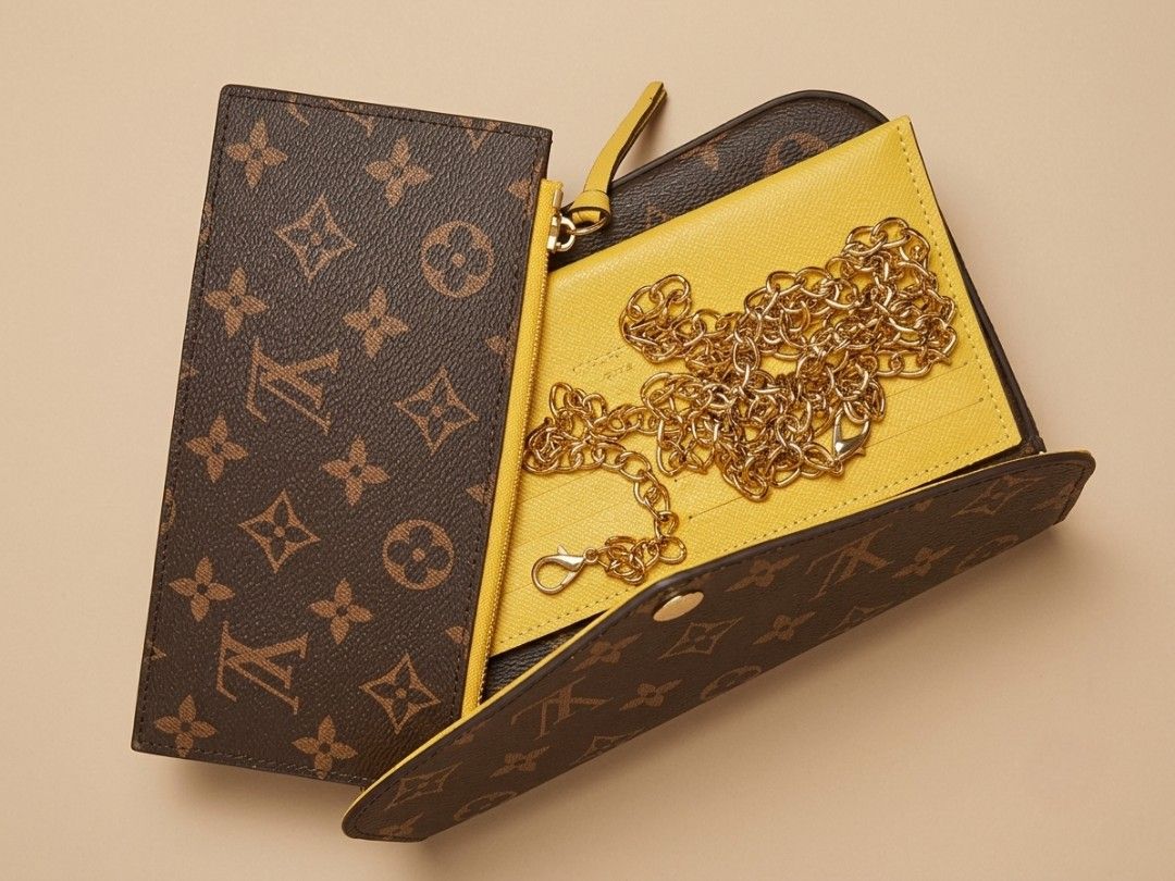 Louis Vuitton Monogram Wallet with Chain and Pouch (Category: Luxury Bags & Wallets) located in Caloocan City. Submitted by seishiyakinoku (Listing ID 1447355571, Image 3). Description: - Authentic Louis Vuitton Monogram Wallet - Includes removable yellow pouch - Comes with a gold chain strap - Features a card holder insert - Original box and dust bag included - Perfect for day or night use ​Description: ​Design: Inspired by the classic LV multi-
