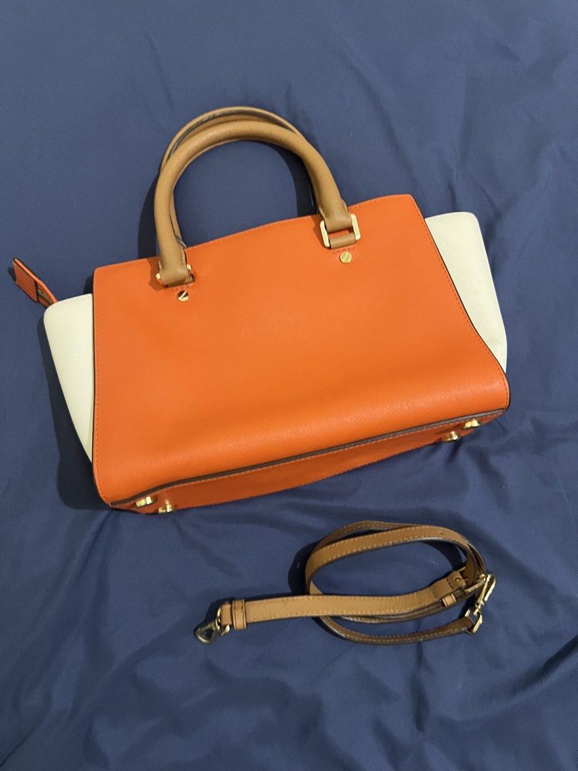 Michael Kors Colorblock Selma Medium Top-Zip Satchel (Category: Luxury Bags & Wallets) located in Manolo Fortich. Submitted by mfthrifts_ (Listing ID 1447398570, Image 2). Description: 🧡This bag is not ukay-sourced. It is guaranteed authentic, bought directly in the USA🧡 - Like new - Color: Mimosa/White/Acorn - Saffiano Leather - Features gold hardware details - Includes detachable adjustable crossbody strap - Spacious interior for everyday ess