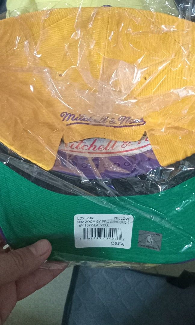 Mitchell and ness lakers snapback cap (Category: Caps & Hats) located in Manila. Submitted by cloudrainskygrey (Listing ID 1447323587, Image 2). Description: authentic mitchell and ness colorway.