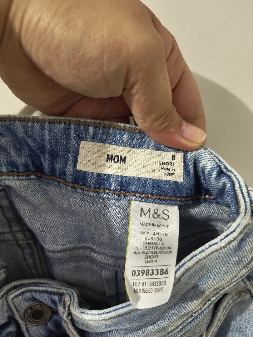 M&S Mom Jeans Size 8 Short (Category: Jeans) located in Las Pinas. Submitted by aerdnaharris (Listing ID 1447351539, Image 3). Description: - Light wash mom jeans - Brand: M&S - Size: 8 Short - Features distressed look with rips - Rolled up hem - Ideal for casual wear.