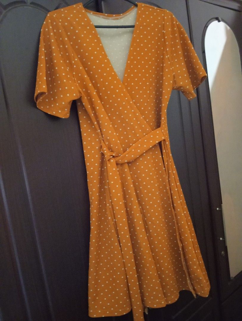 Mustard Yellow Wrap Dress (Category: Dresses) located in Lipa City. Submitted by bookshaven (Listing ID 1447402631, Image 1). Description: Mustard Yellow Wrap Dress -white polka dot pattern -matching fabric belt included -flutter sleeves - Versatile for casual outings or office wear - Easy to style.
