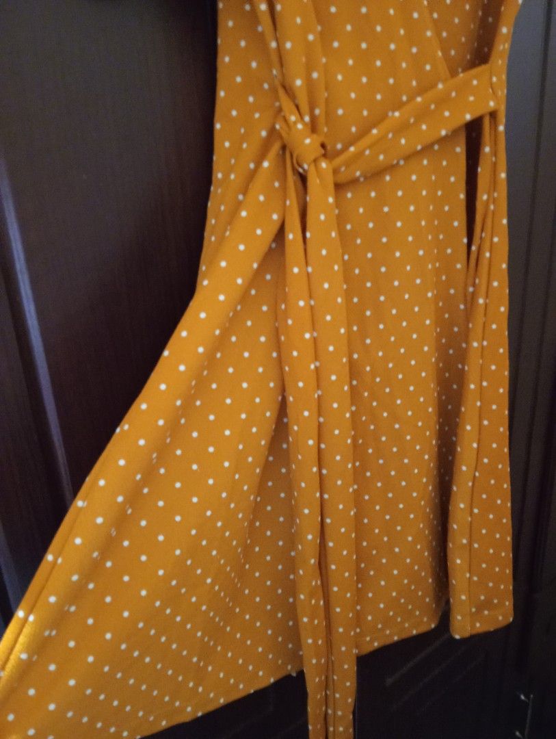 Mustard Yellow Wrap Dress (Category: Dresses) located in Lipa City. Submitted by bookshaven (Listing ID 1447402631, Image 2). Description: Mustard Yellow Wrap Dress -white polka dot pattern -matching fabric belt included -flutter sleeves - Versatile for casual outings or office wear - Easy to style.